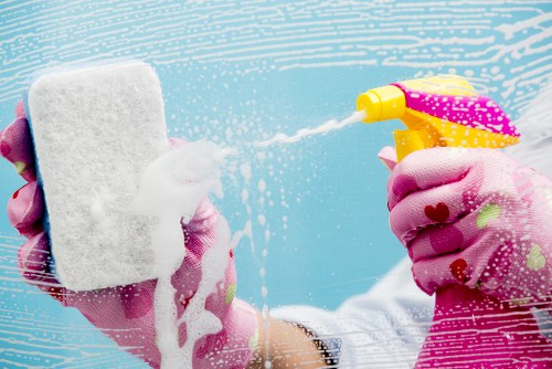 Local carpet cleaner treating high-traffic commercial flooring in SW5