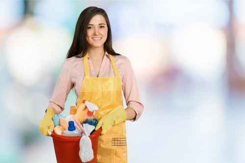 Office cleaning team preparing a workplace in SW5